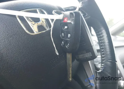 2012 Honda Odyssey Touring/Touring Elite z USA, uszkodzony, nr VIN 5FNRL5H94CB035497